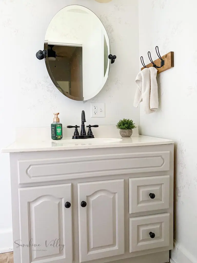 farmhouse bathroom with DIY farmhouse towel rack